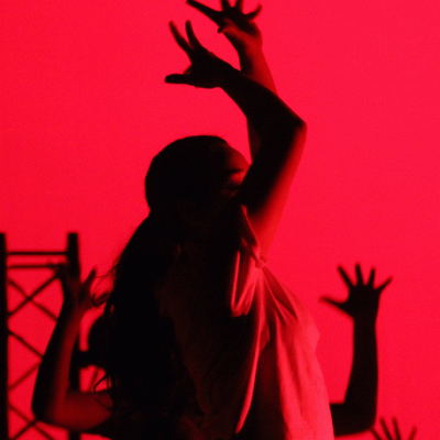 Senior Diana Martinez poses in the opening of the 2016 Orchesis show, "Amplified." Photo by Emily Butera.