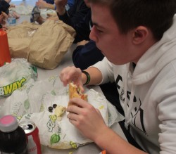 Junior John Kruk eats Subway to boycott Organic Life's cafeteria food during #lunchstrike2013 Tuesday, Jan. 29. PHOTO by Alyssa Guzman