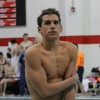 Senior Drake Nickell shivers after getting out of the swimming pool. Photo by Rebecca Yun.