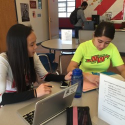 Junior Amanda Lee tutors junior Sam Aessa on math during 9th period on Friday, Dec. 4. Photo by Grace Geraghty