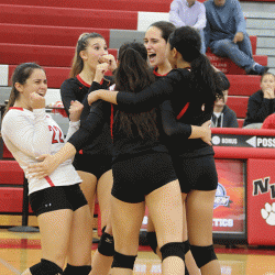 The team celebrates after its first win against the Trevians. Photo by Sophia George