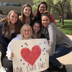 Students stand against racism Friday, April 27. Photo by Isa Gil